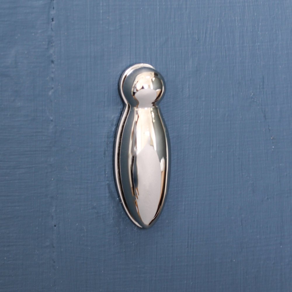 A keyhole escutcheon shaped in a classic pear drop design. Cast from solid brass with a polished nickel finish