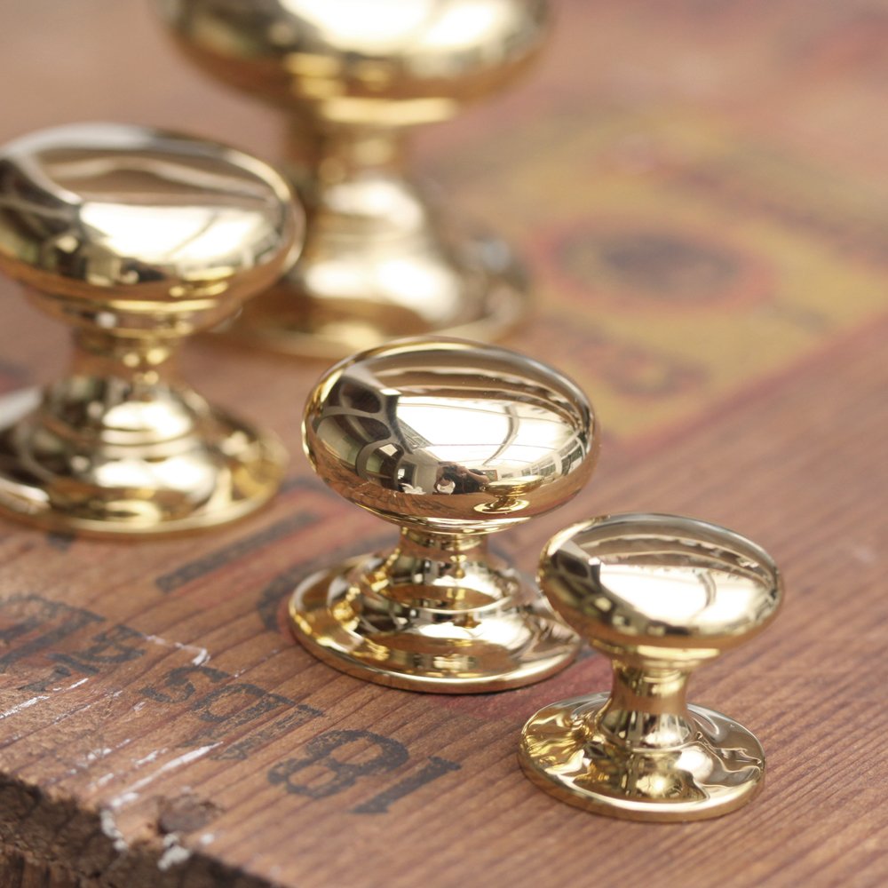 Traditional brass cupboard knobs in different sizes