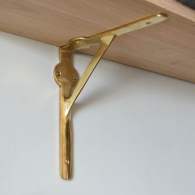 Polished Brass Workshop Bracket Holding Wooden Shelf