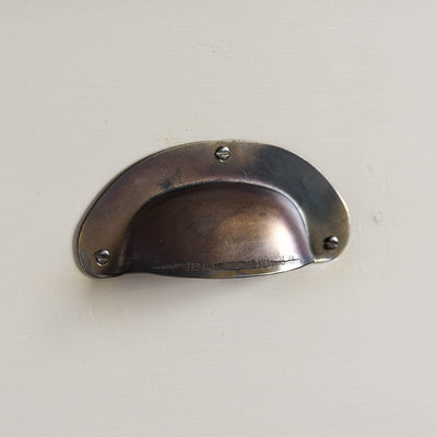 Pressed Brass Drawer Cup Handle in Aged Finish Variant