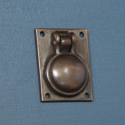 Back of Flush Fit Ring Pull in distressed antique brass finish.
