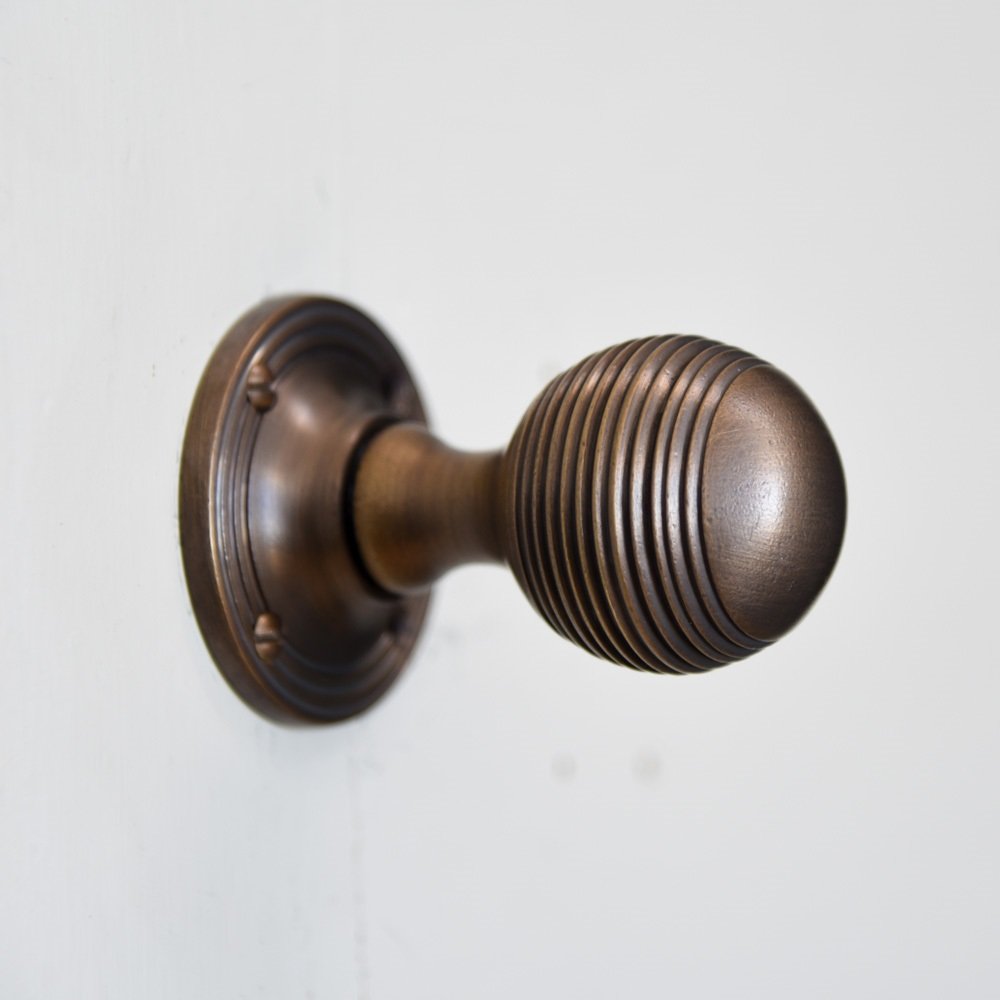 Solid brass Reeded Beehive Door Knobs in Distressed Antique finish