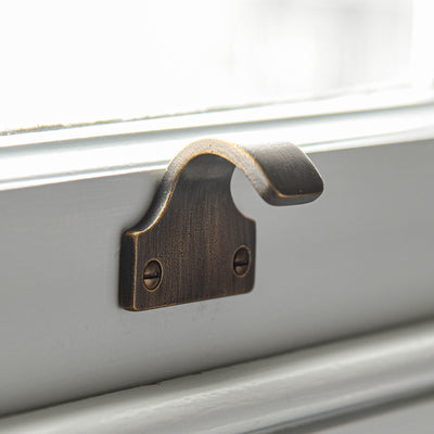 Solid brass Sash Window Lift in Distressed Antique finish.