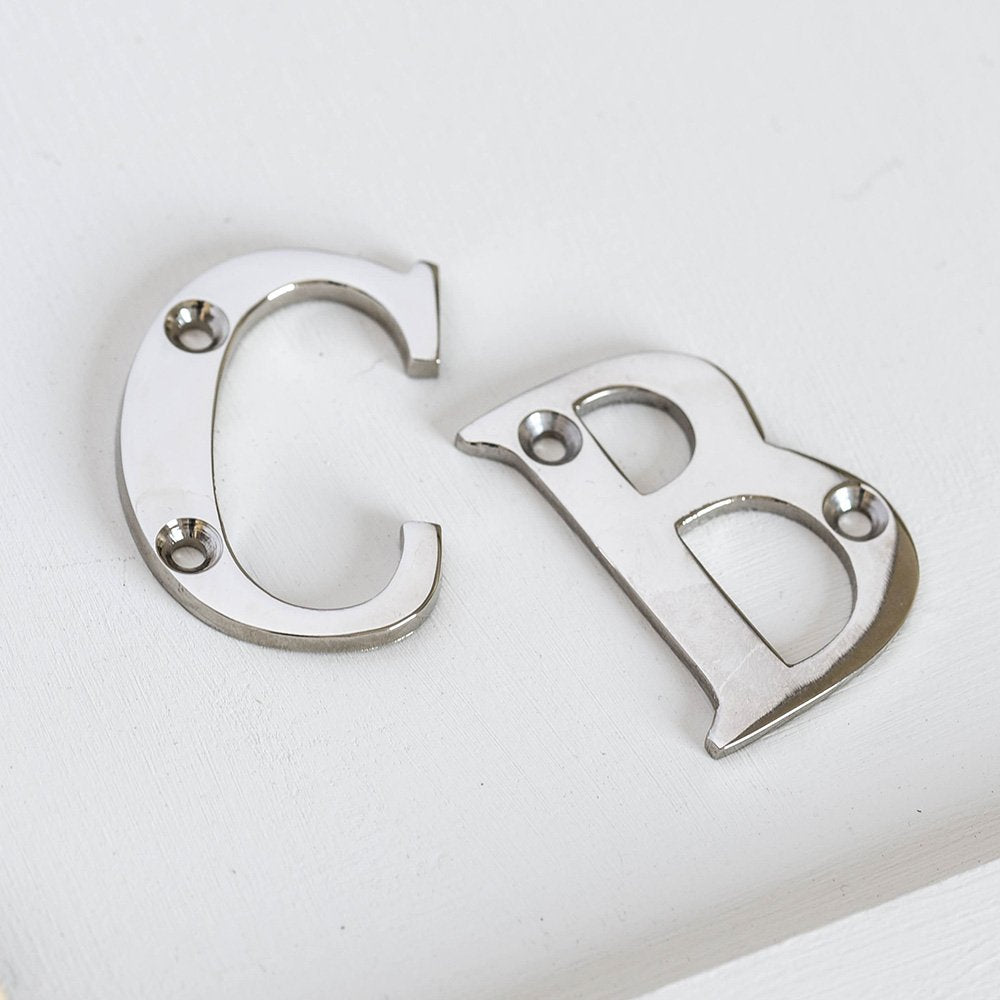 Solid brass 2 inch Letters in Polished Nickel plated finish.