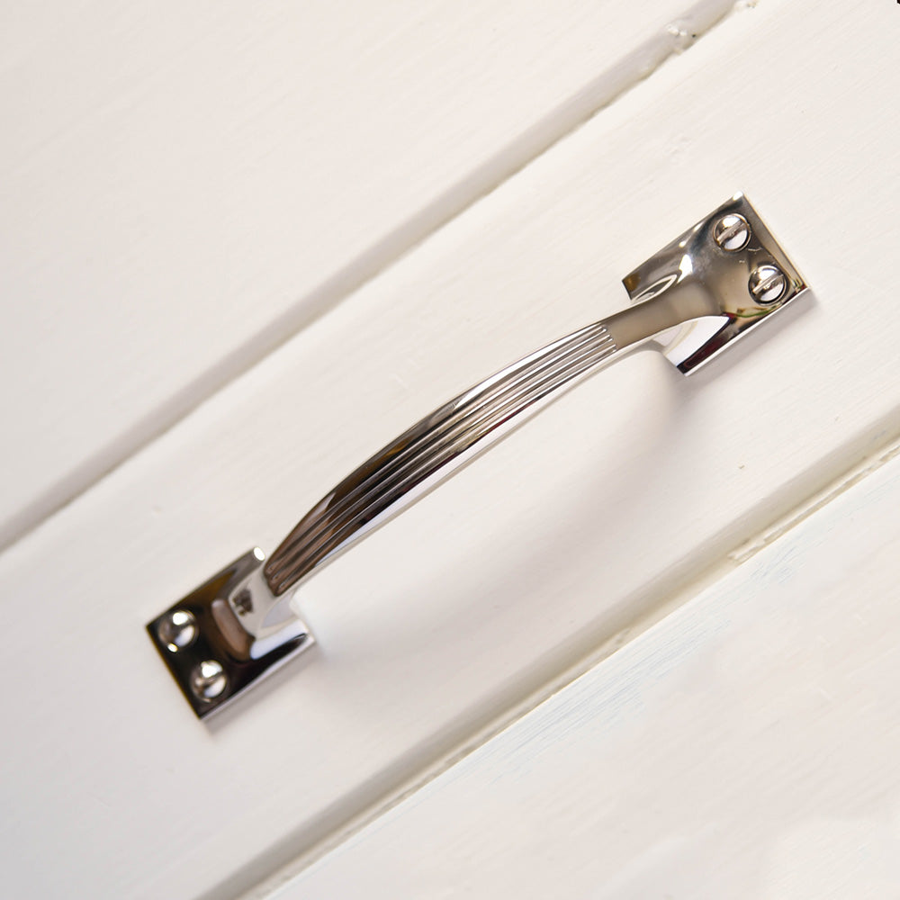 Solid brass Reeded Pull Handle in Polished Nickel finish.