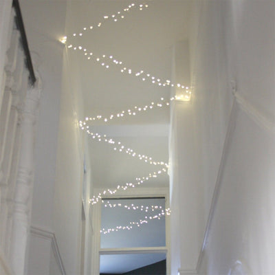 Silver Wire LED Fairy Lights Hanging Across Ceiling