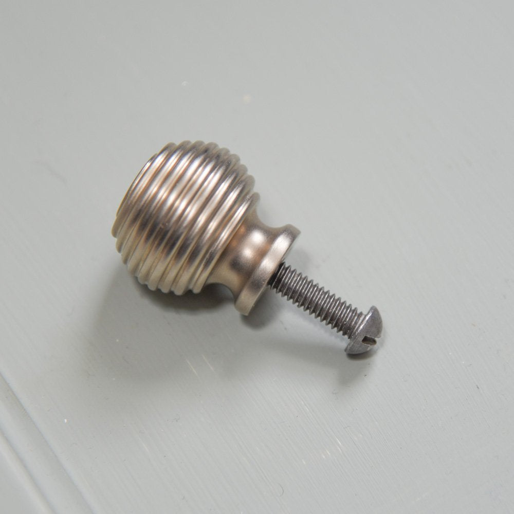 Close up of solid brass Queen Anne Beehive Cabinet Knob plated in Satin Nickel finish
