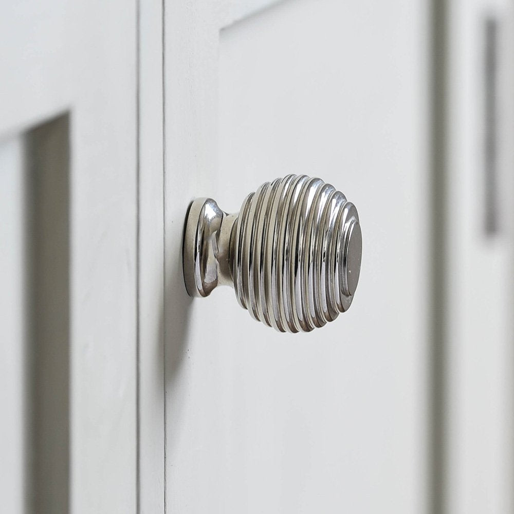 Solid brass Queen Anne Beehive Cabinet Knob plated in Polished Nickel finish.