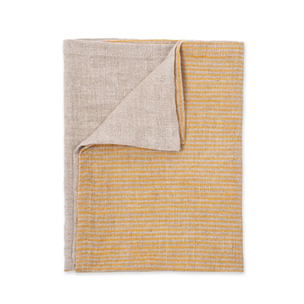 Striped yellow and cream linen napkins with a corner folded over to show plain napkin 