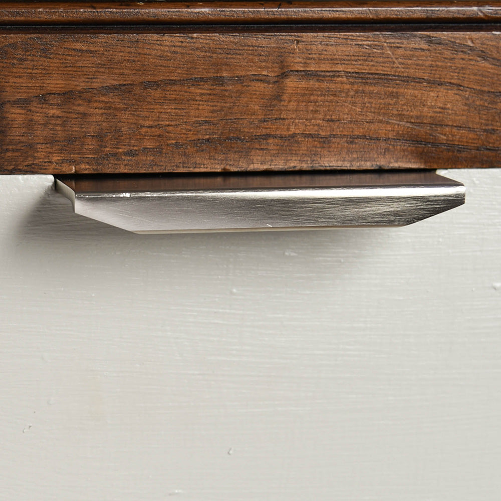 Tapered Cabinet Edge Pull in Satin Nickel.