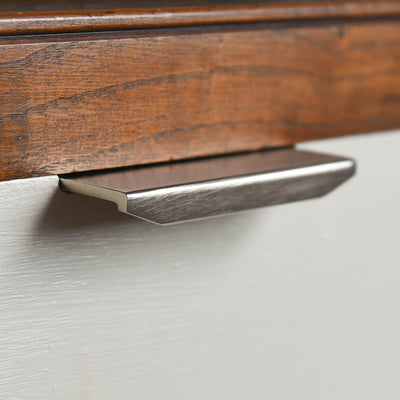 Close up of Tapered Cabinet Edge Pull in Satin Nickel.