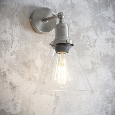 Satin nickel wall light with glass cone shade