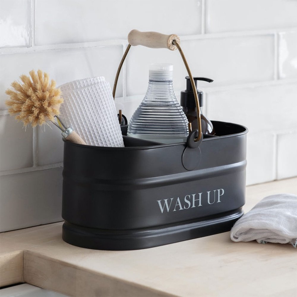 Dark carbon coloured metal wash up tidy with three compartments. Metal handle and beechwood grip. 'Wash up' printed on side in capital letters