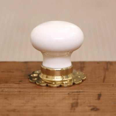 White Ceramic Door Knobs with Brass Petal Backplates