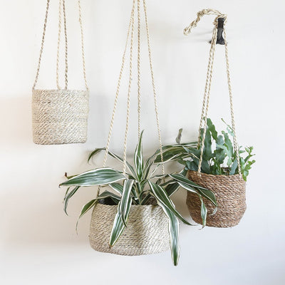 Woven hanging planters including tall jute(left), wide tapered jute (middle) and short seagrass (right)